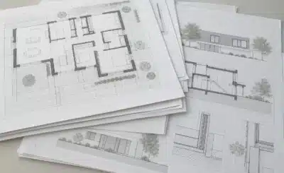 Plan d’architecture montrant des dessins et des perspectives de bâtiment.